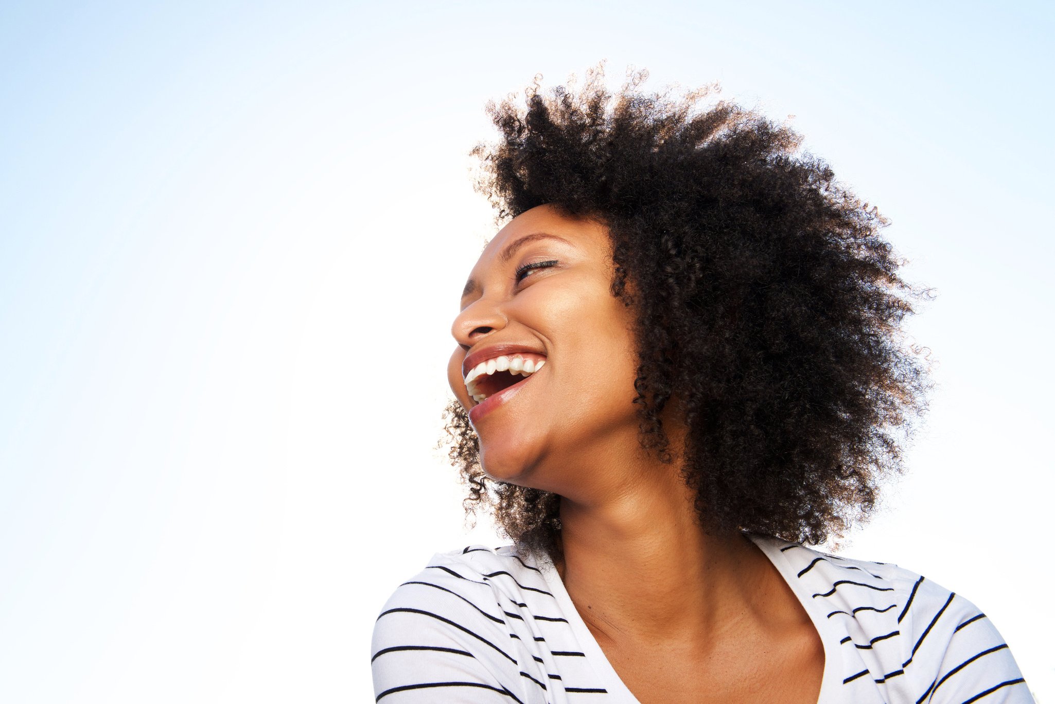 Happy Woman with Curly Hair